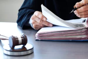 Judge with gavel on table